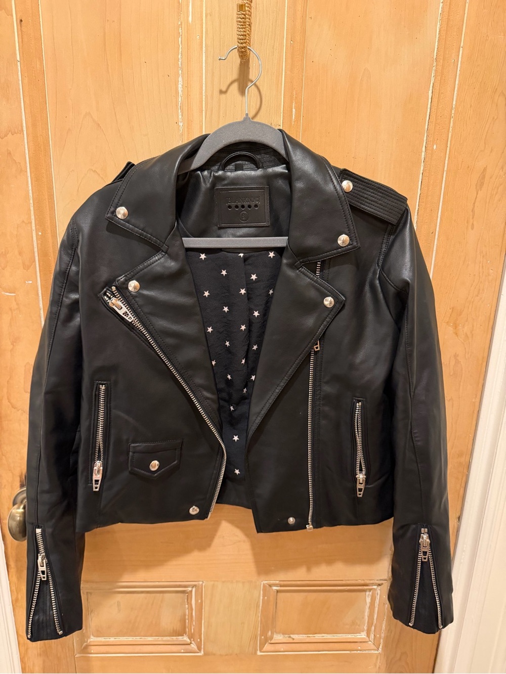 Blank NYC Black Faux Leather Moto Jacket with Star Lining